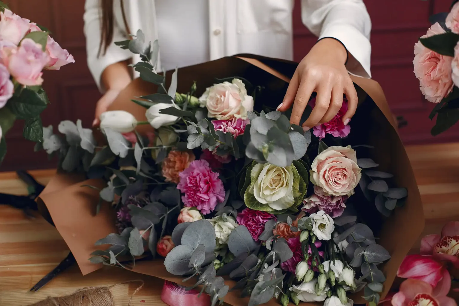 bouquet of flowers wrapped with brown paper