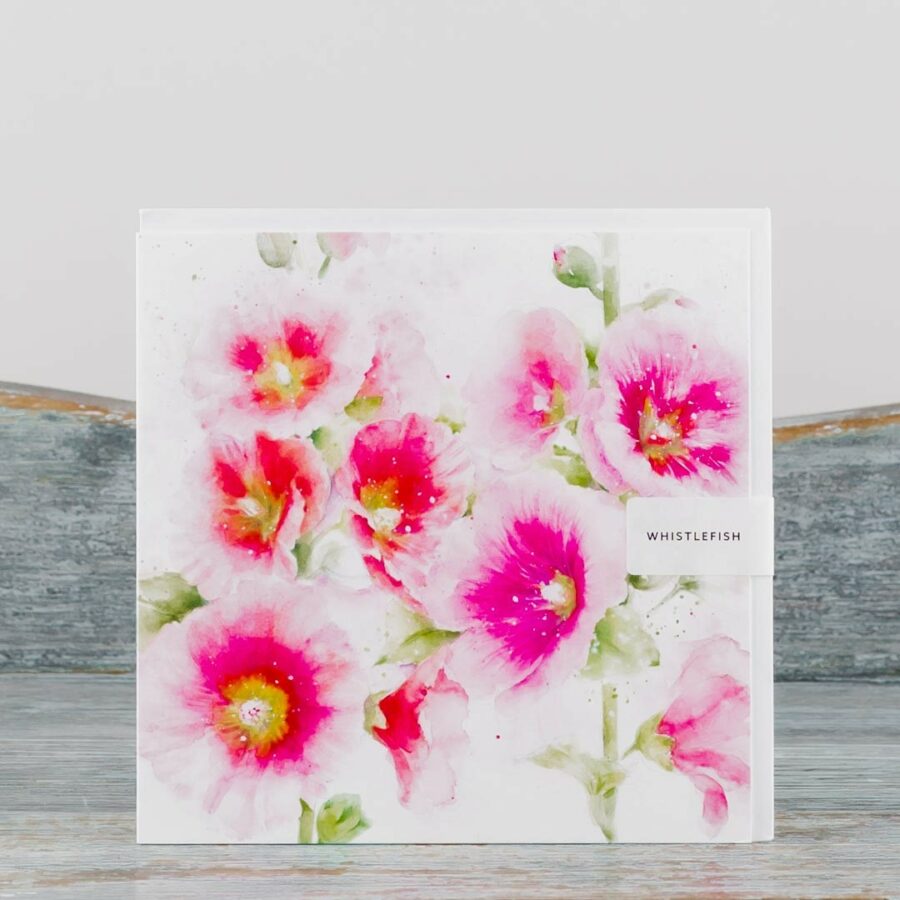 large greeting card with white envelope made by whistlefish cover depicts vibrant pink Hollyhock flowers with light lime green stems in watercolour blank inside