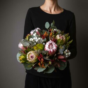posy made with fresh seasonal native flowers including protea kangaroo paw leucadendron tetragona gumnuts and eucalyptus foliage