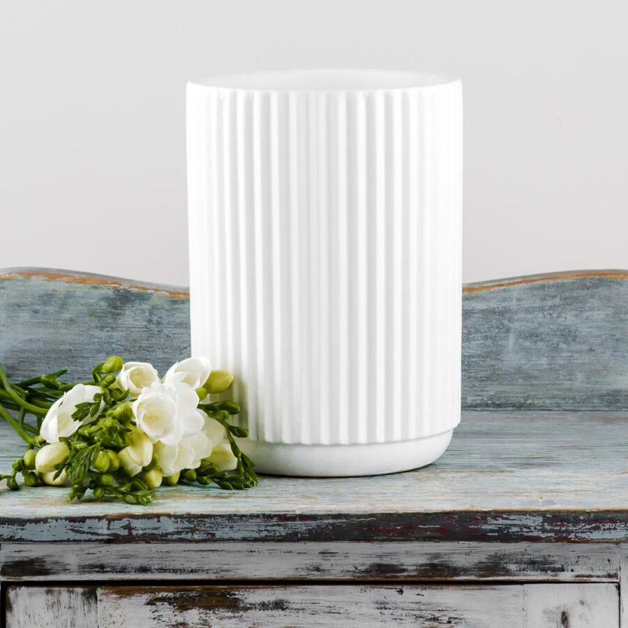 tall white vertical ribbed ceramic vase
