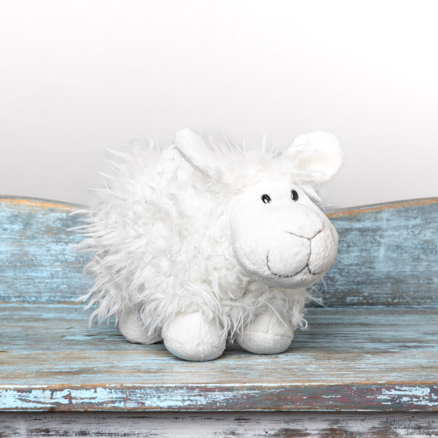 white soft toy sheep with shaggy fur